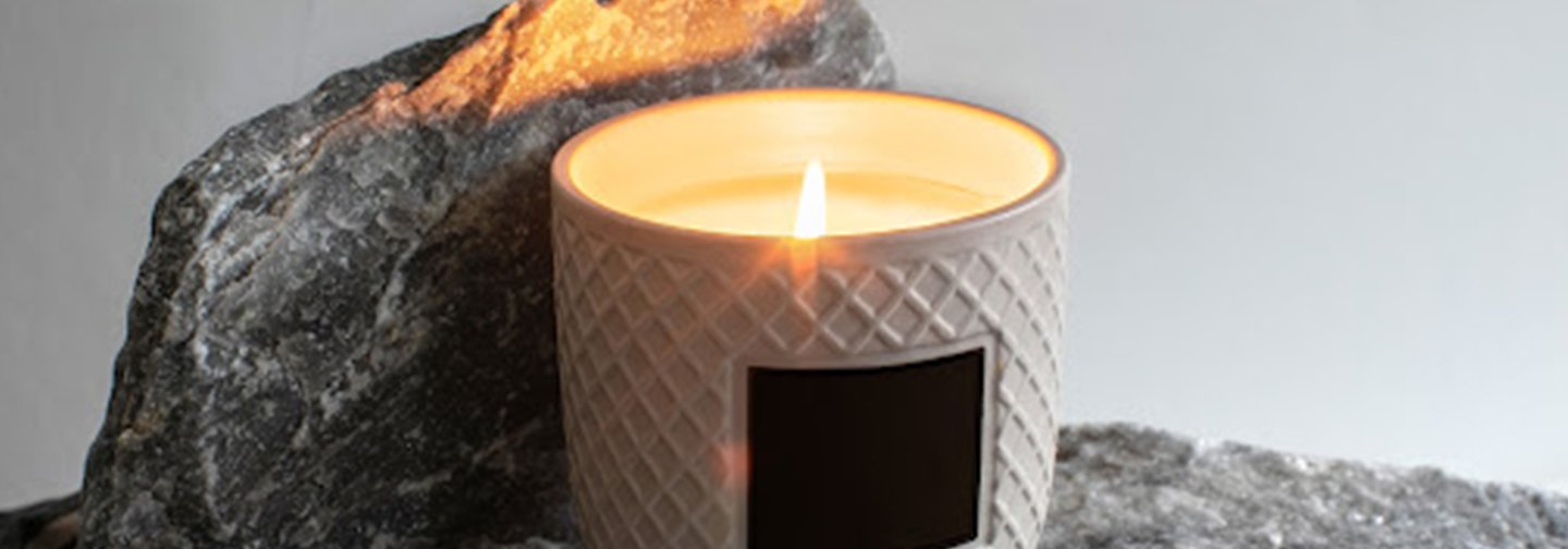lotion candle on stone | how to use a lotion candle