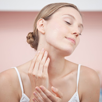 Can A Lotion Candle Be Your Go-To Neck Lotion? applying lotion on neck | neck lotion